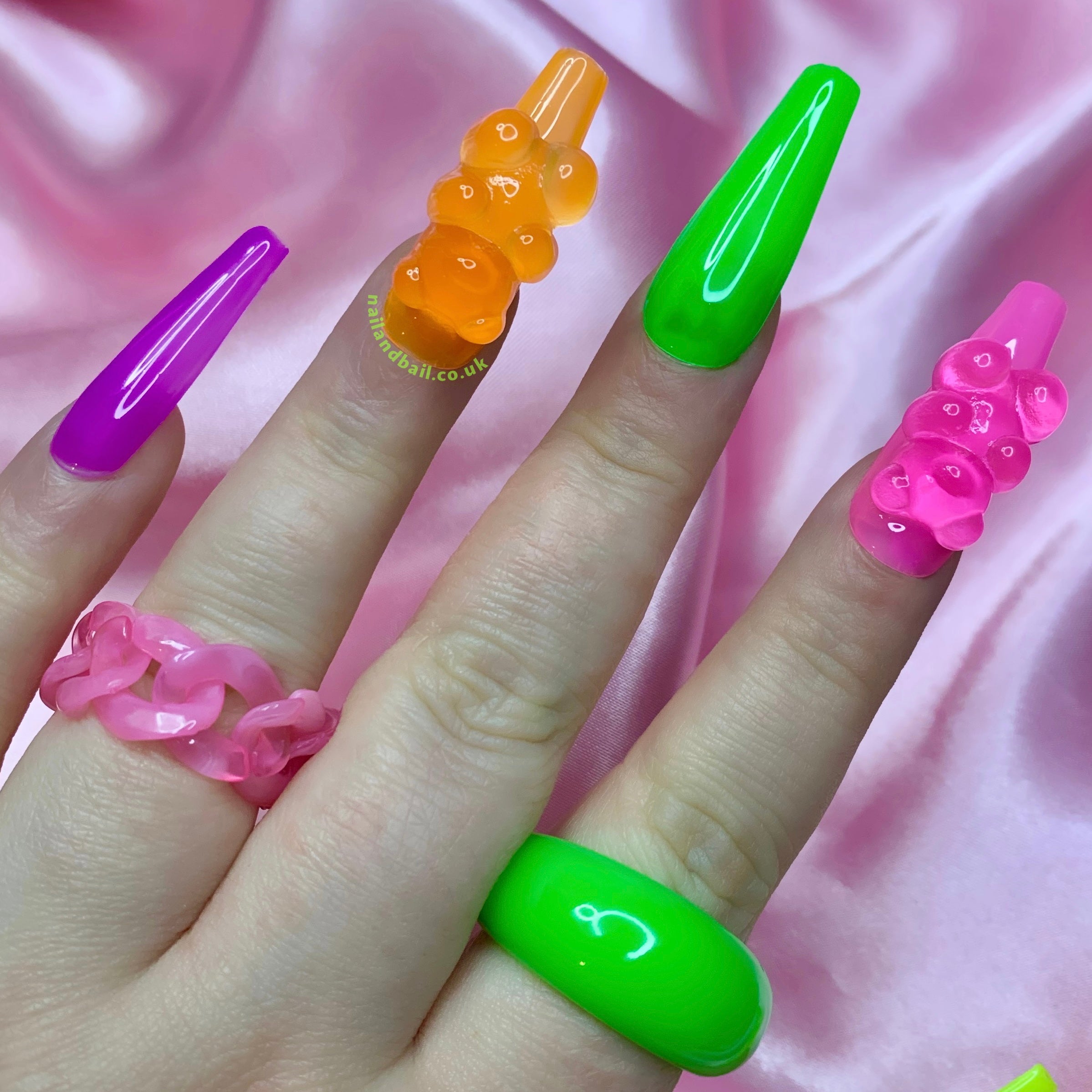 Introducing our delightful handmade Jelly Bear Press On Nails! Designed to add a touch of whimsy and sweetness to your fingertips, these nails are the perfect accessory for any occasion. Featuring a vibrant array of multicoloured jelly bases, each nail exudes a playful and translucent look that captures the essence of summer fun.